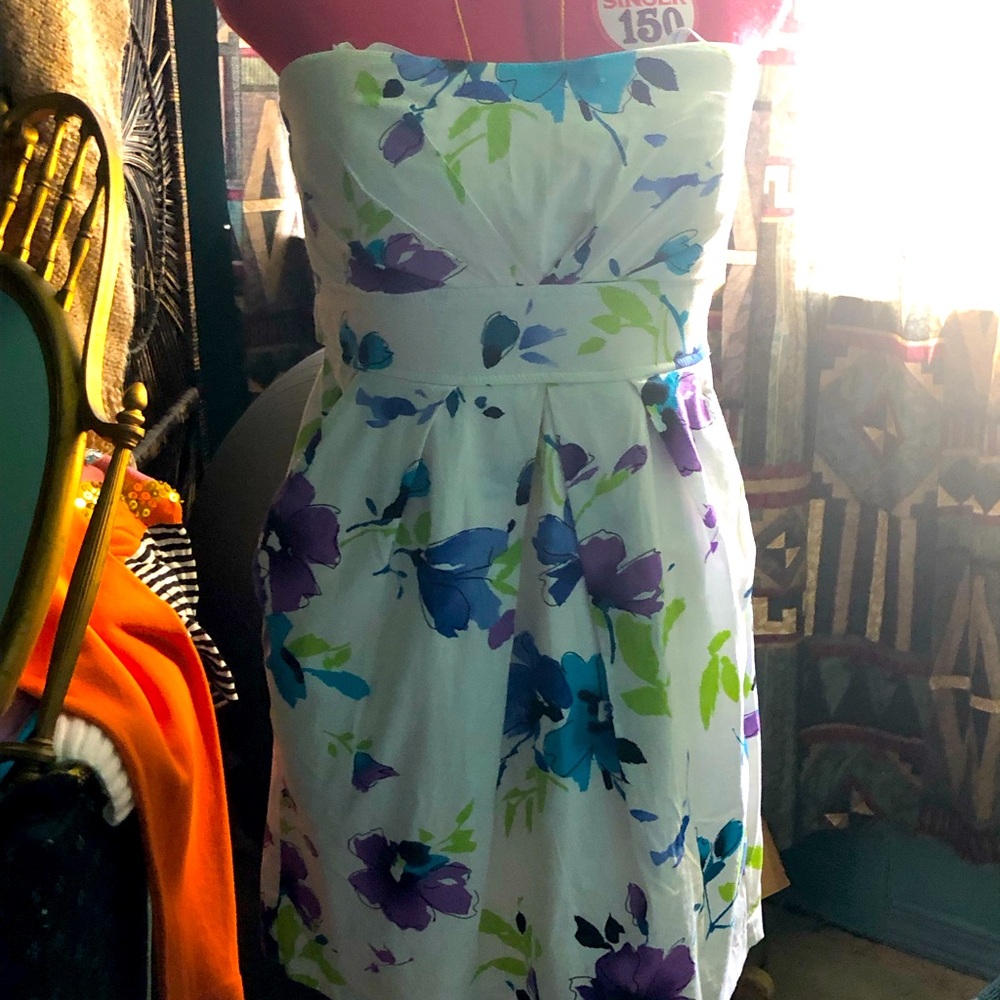 Cotton summer dress 26 inches from bust to hemline. Fits size 6 perfect.